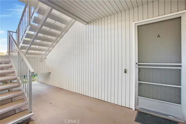 a view of entryway with stairs