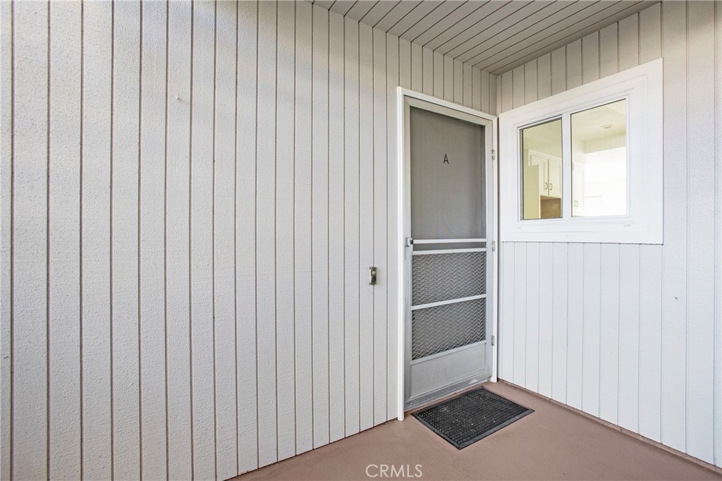 2137 Ronda Granada, Unit A Laguna Woods, CA 92637 - Photo 5 of 16 a view of an empty room with a window