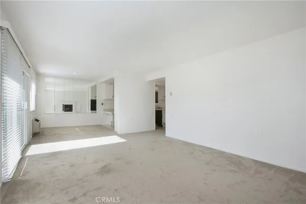 an empty room with a natural light