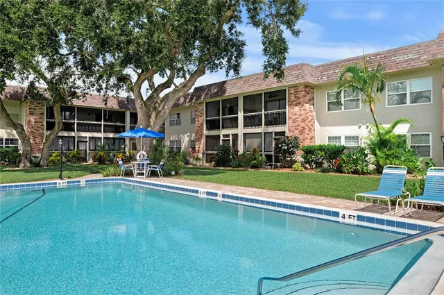 a view of a house with a swimming pool