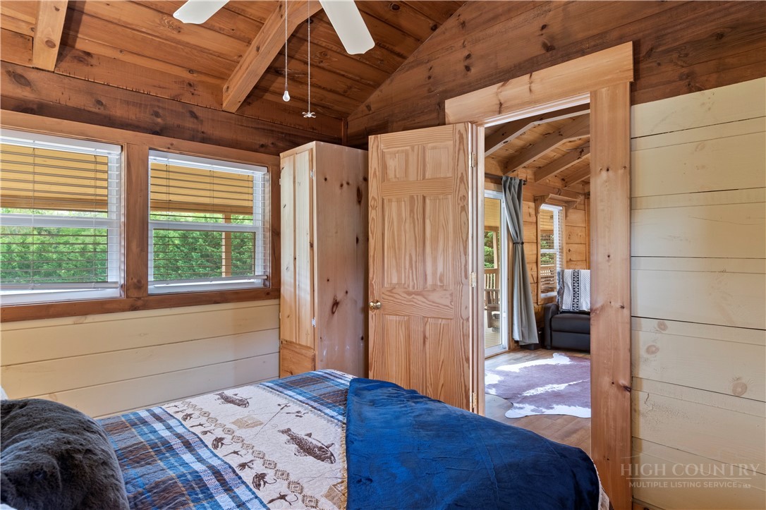 489 Buttons Lane Sparta, NC 28675 - Photo 17 of 30 a bedroom with a bed and a window