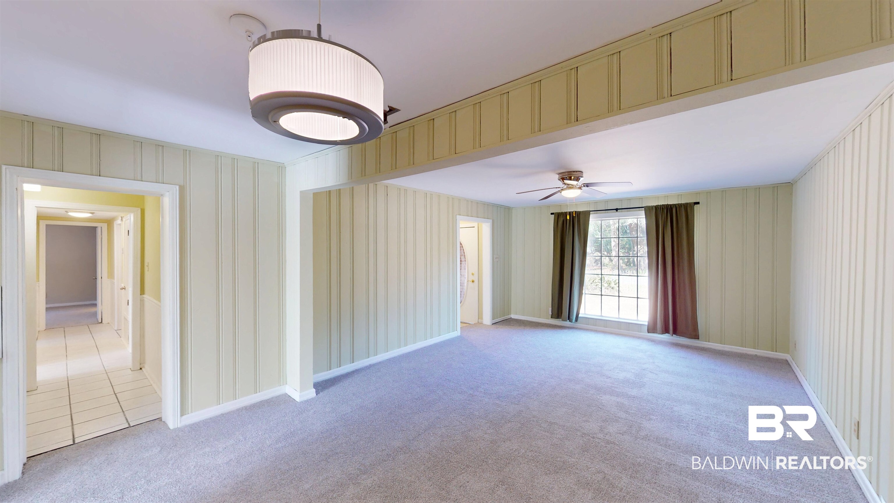 1471 Cedar Crescent Drive Mobile, AL 36605 - Photo 6 of 28 Spare room with ceiling fan and light colored carpet