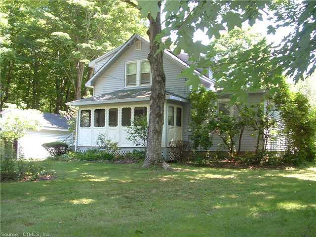 269 Clover Mill Road Mansfield, CT 06268 - Photo 1 of 1 a front view of house with yard and green space