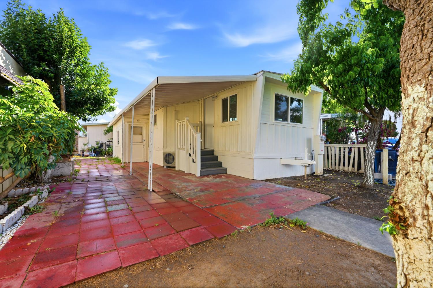 715 South Kaweah Avenue, Unit 9 Exeter, CA 93221 - Photo 2 of 15 a view of backyard of house
