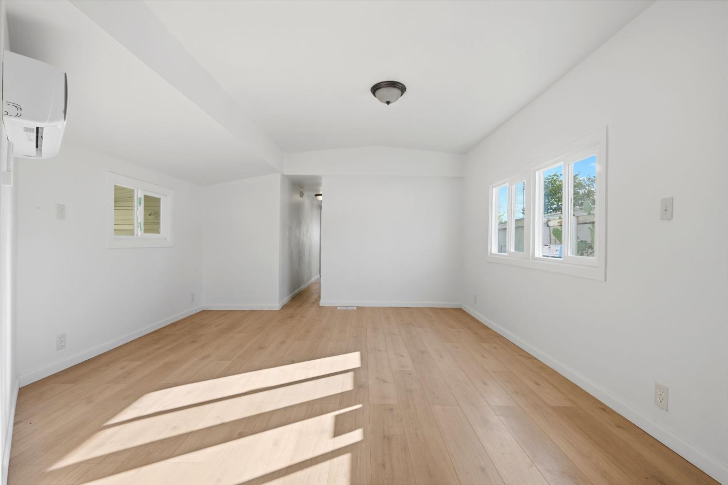 715 South Kaweah Avenue, Unit 9 Exeter, CA 93221 - Photo 5 of 15 a view of an empty room with a window