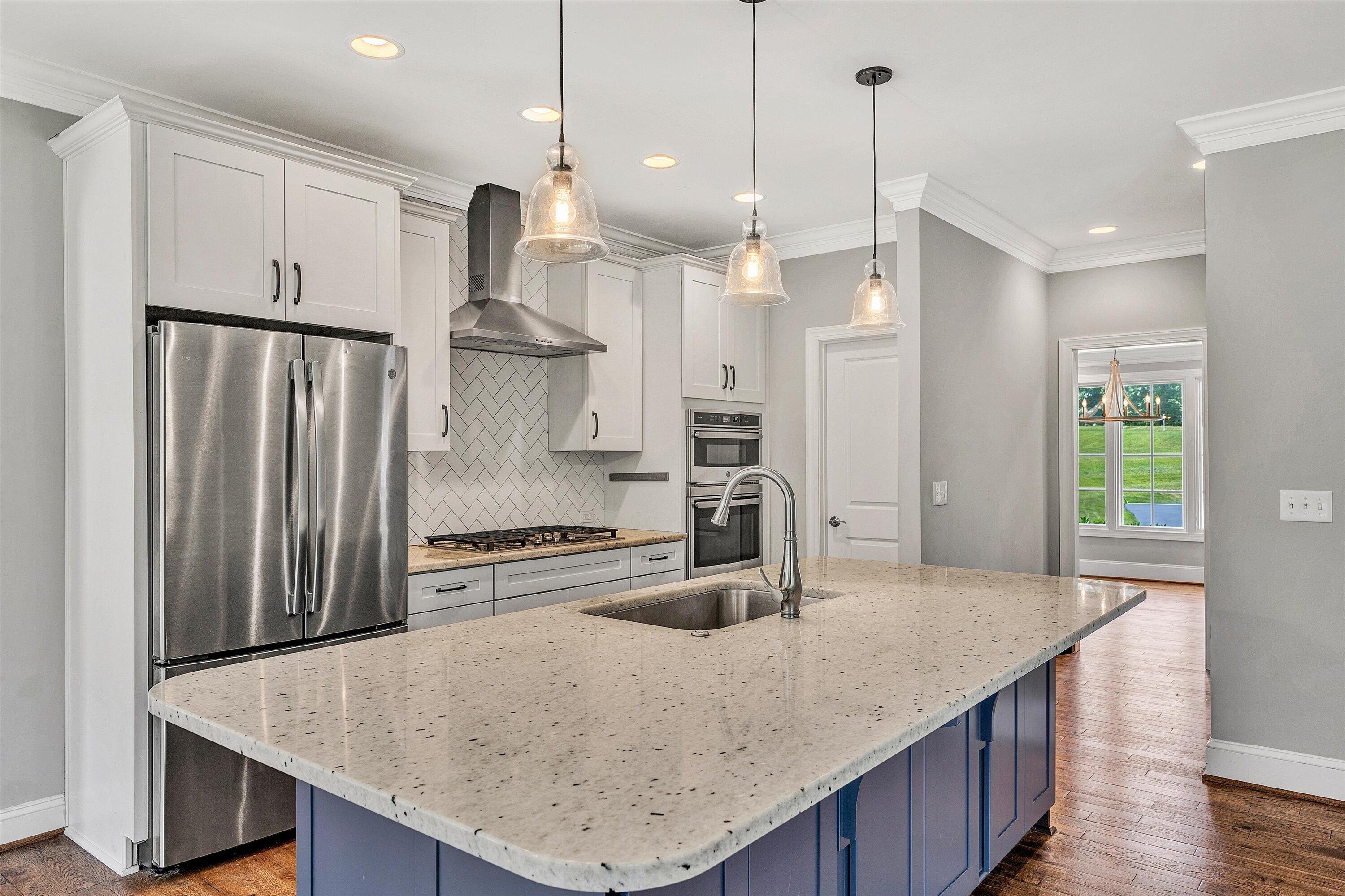 6981 Fairway Ridge Road Salem, VA 24153 - Photo 16 of 53 a kitchen with stainless steel appliances granite countertop a sink refrigerator and cabinets