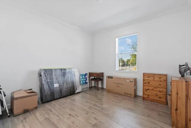 a bathroom with a sink toilet and a mirror