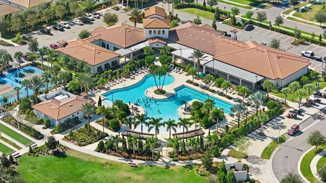 an aerial view of multiple houses with yard