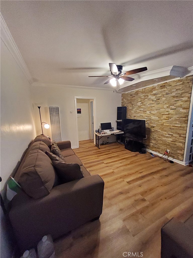 728 Cedar Avenue, Unit 29 Long Beach, CA 90813 - Photo 3 of 14 a living room with furniture