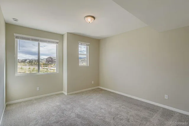 a bathroom with a double vanity sink and mirror