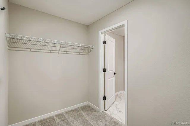 a bathroom with a double vanity sink mirror and shower