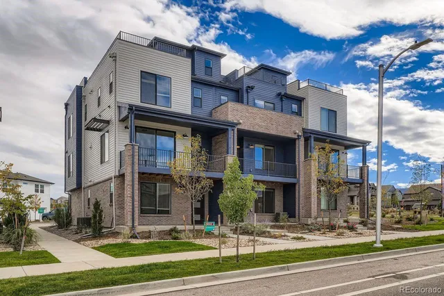 a front view of multi story residential apartment building