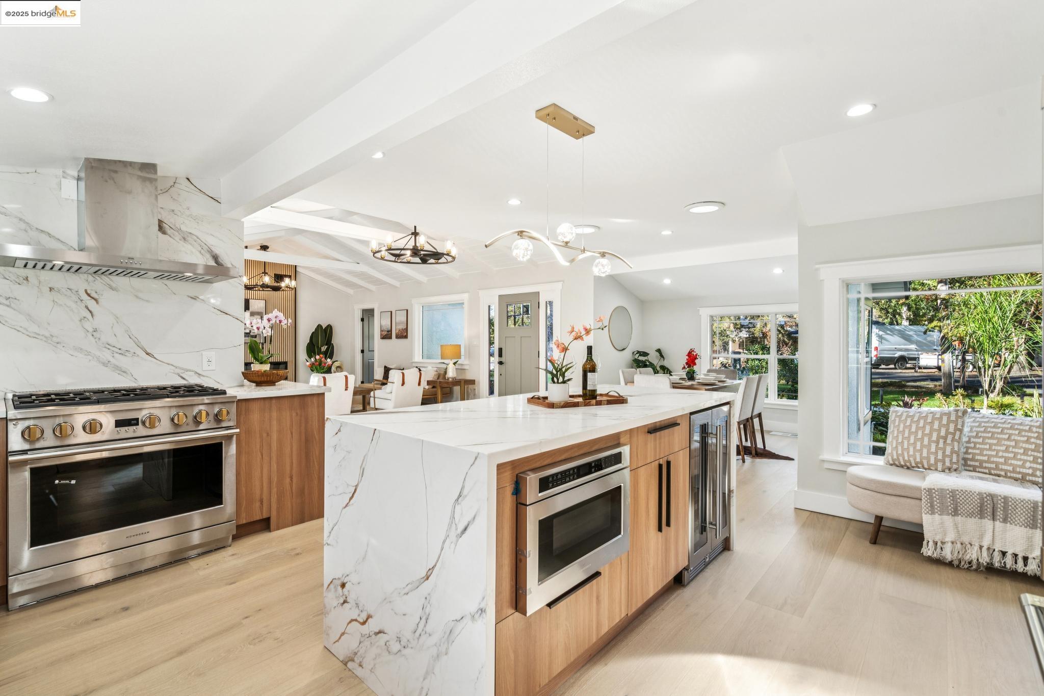 1333 Milton Avenue Walnut Creek, CA 94596 - Photo 14 of 59 a open kitchen with stainless steel appliances granite countertop a stove and a sink