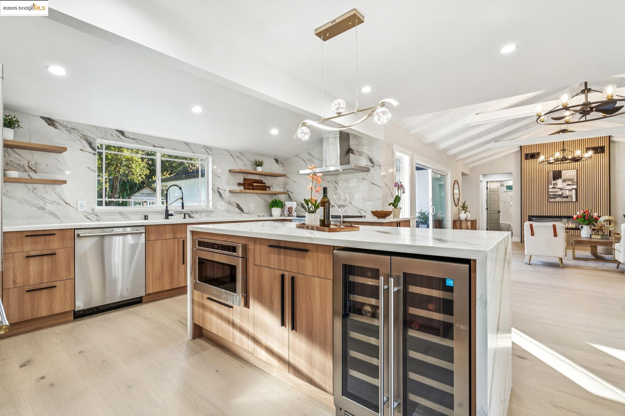 1333 Milton Avenue Walnut Creek, CA 94596 - Photo 16 of 59 a kitchen with a sink stove and cabinets