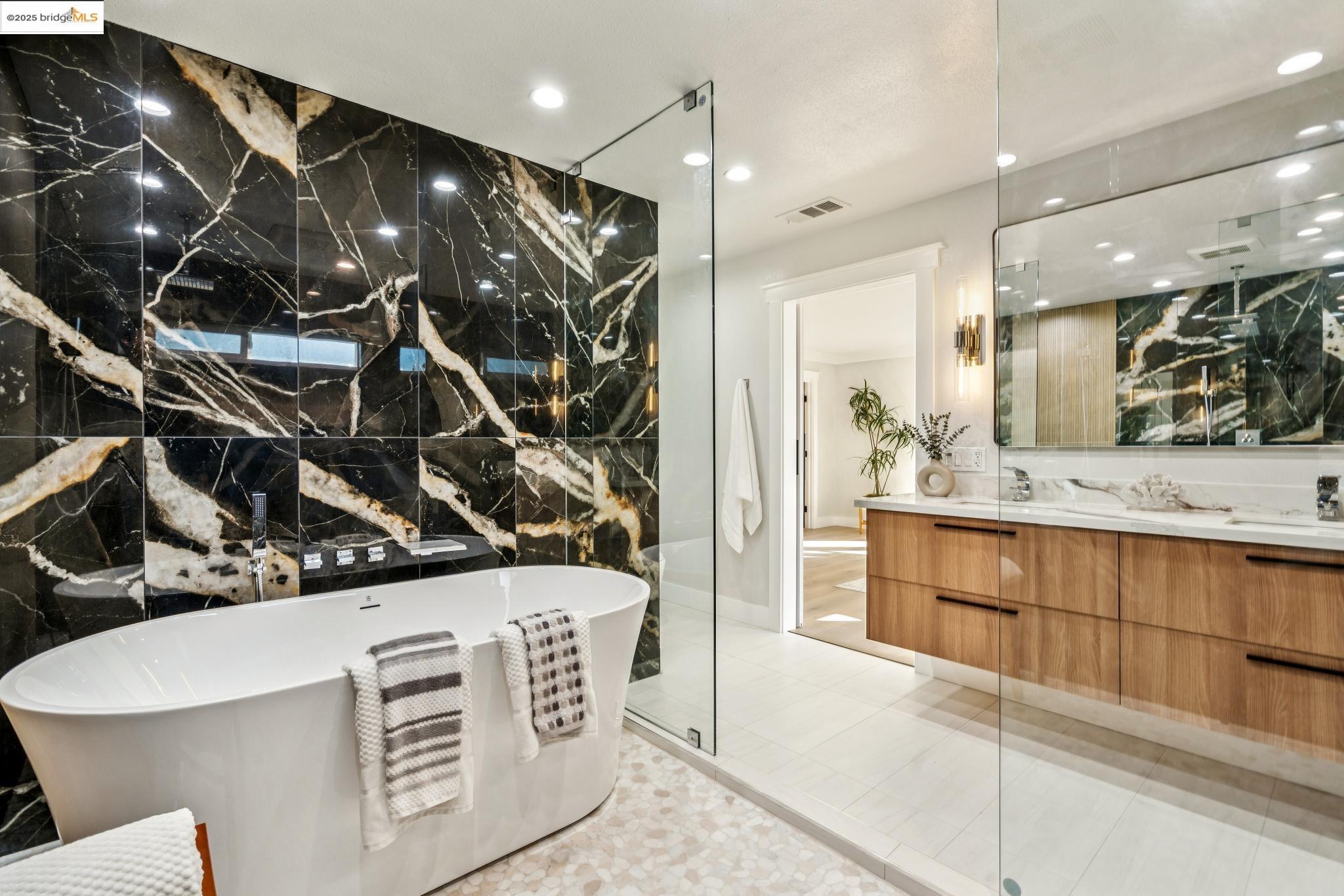 1333 Milton Avenue Walnut Creek, CA 94596 - Photo 23 of 59 a bathroom with a sink a mirror and a shower