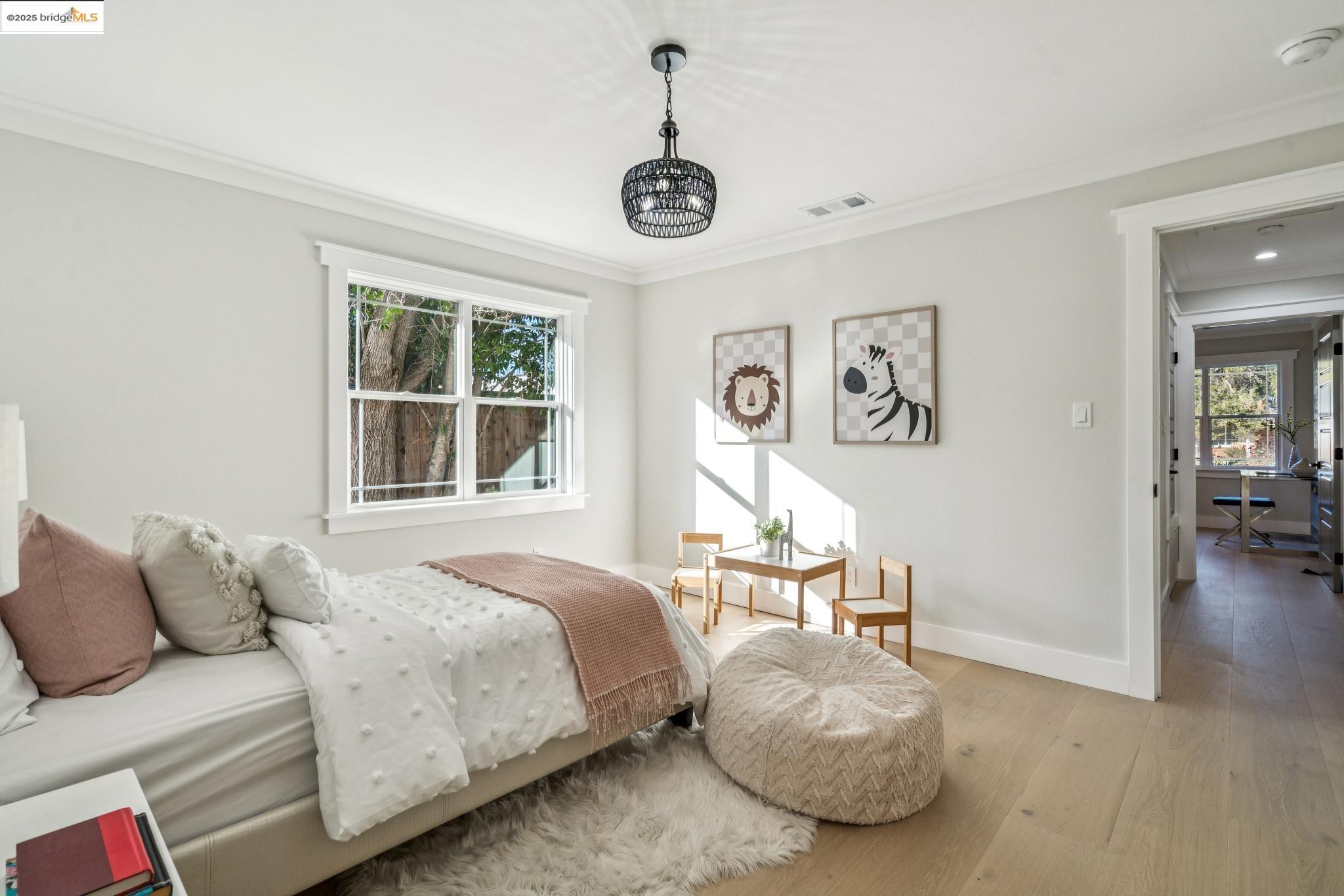 1333 Milton Avenue Walnut Creek, CA 94596 - Photo 28 of 59 a bedroom with a bed and a window
