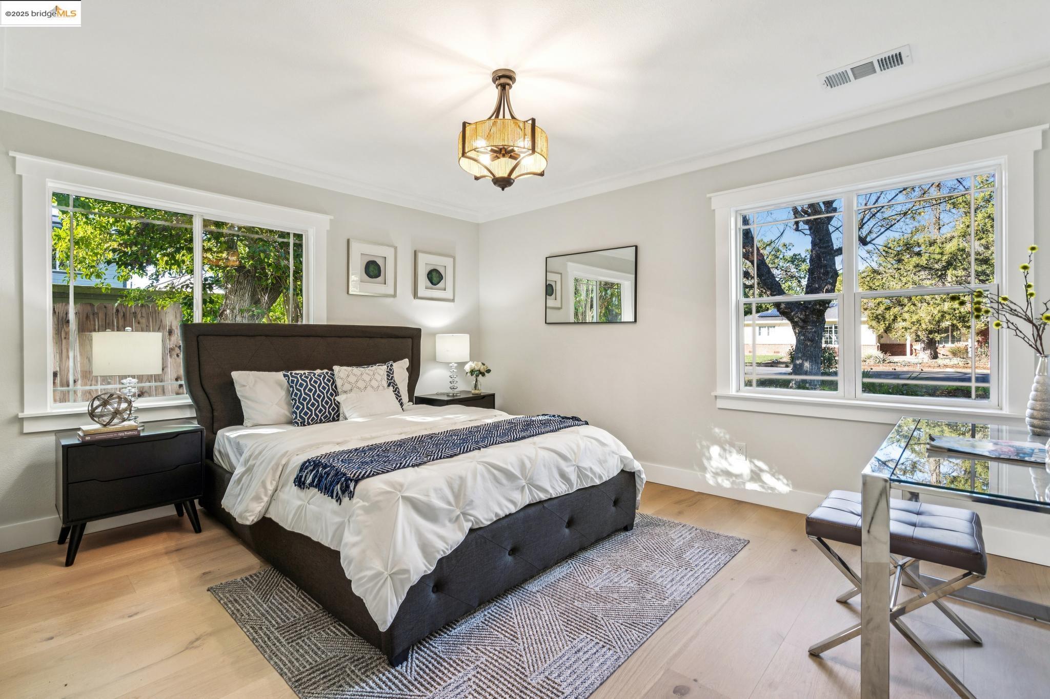 1333 Milton Avenue Walnut Creek, CA 94596 - Photo 30 of 59 a bedroom with a large bed and a window