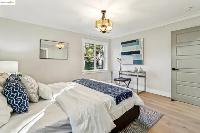 a view of a patio with table and chairs and potted plants