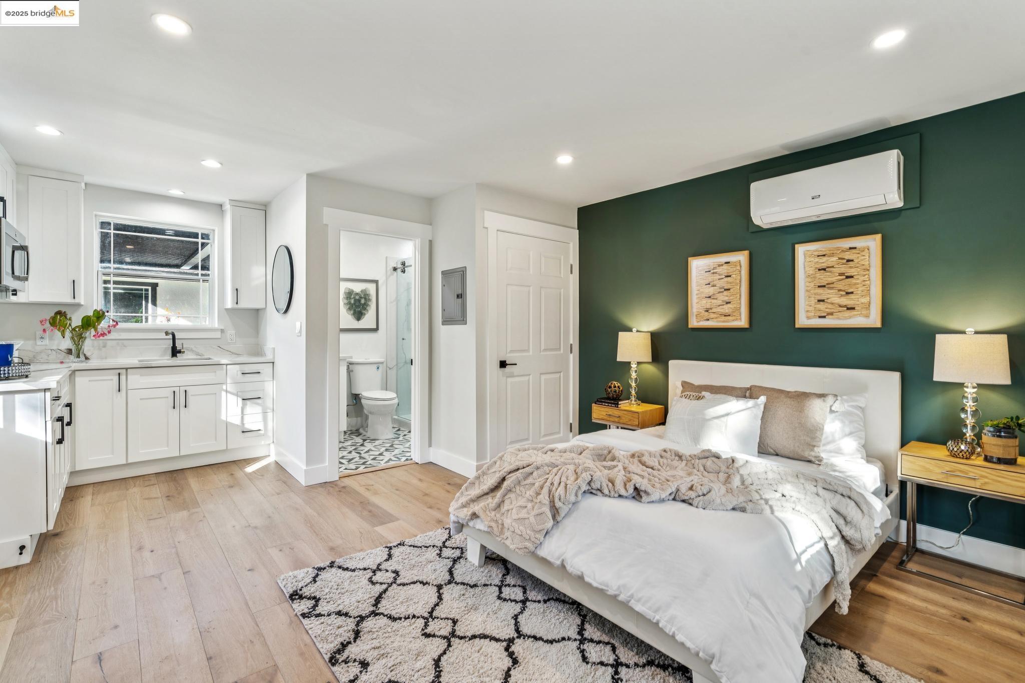 1333 Milton Avenue Walnut Creek, CA 94596 - Photo 35 of 59 a bedroom with a bed and a view of kitchen