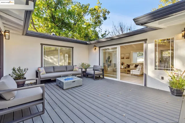 a outdoor space with patio furniture and garden