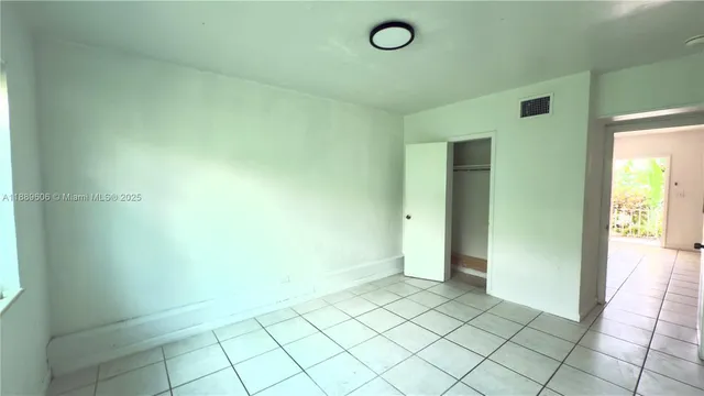 an empty room and closet