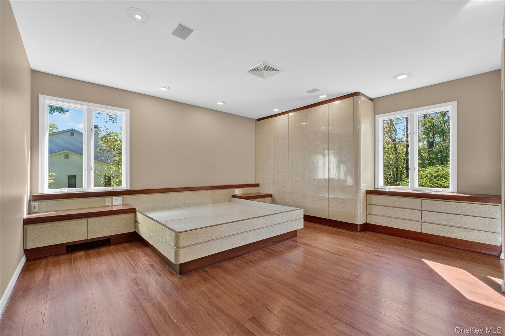 18 Millbank Road Poughkeepsie, NY 12603 - Photo 20 of 50 a spacious bedroom with a large bed and large window
