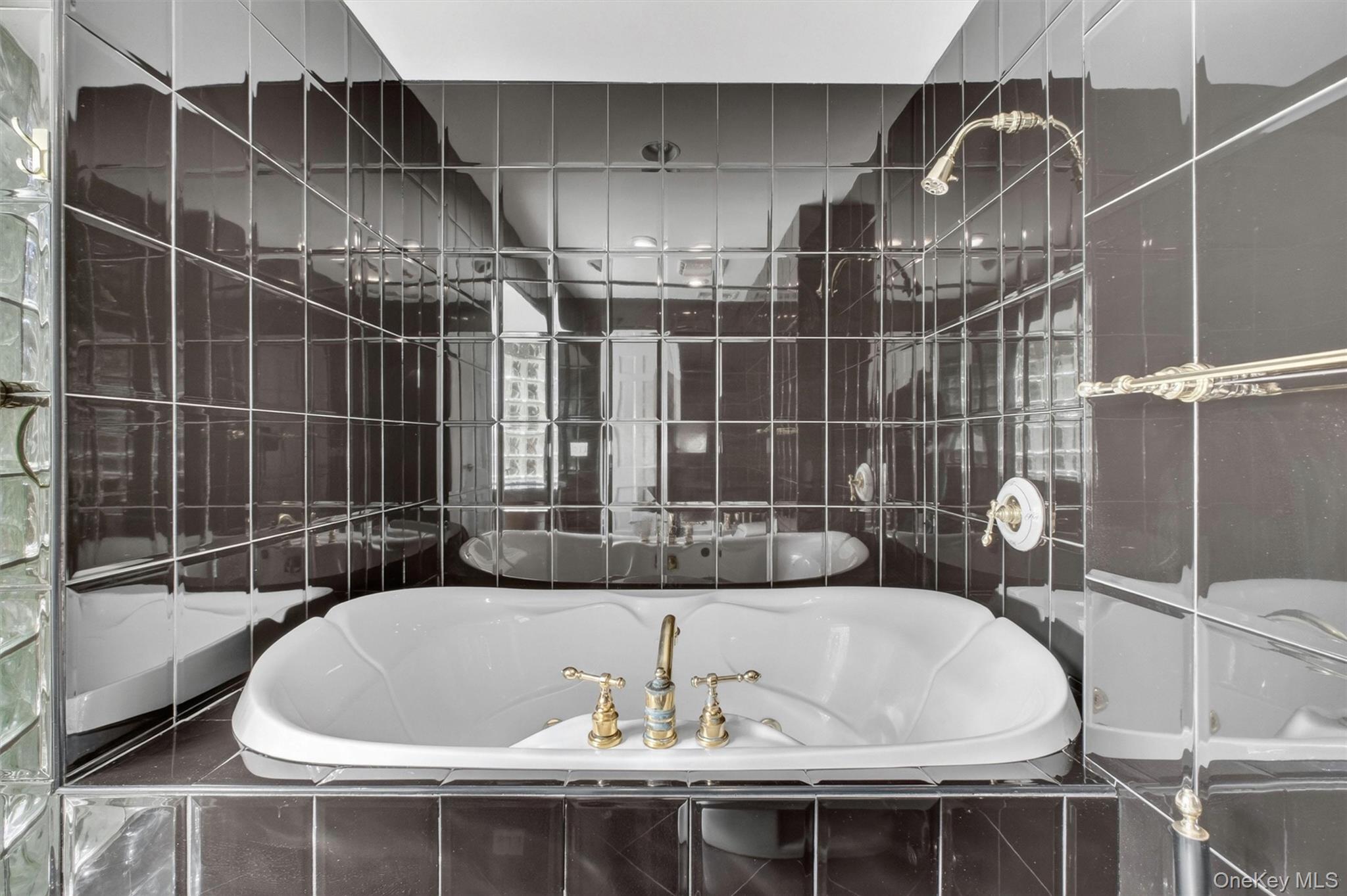 18 Millbank Road Poughkeepsie, NY 12603 - Photo 23 of 50 a bath tub sitting next to a bathroom