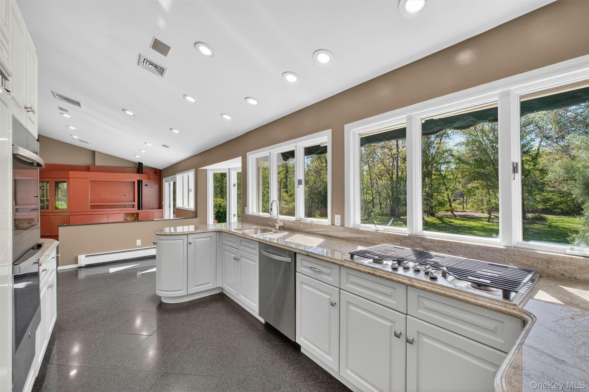 18 Millbank Road Poughkeepsie, NY 12603 - Photo 3 of 50 a large white kitchen with a large window