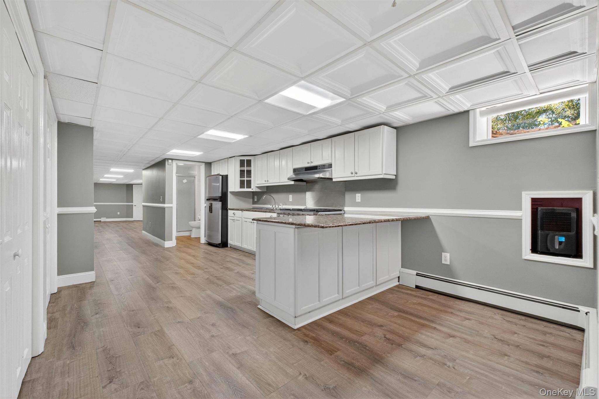 18 Millbank Road Poughkeepsie, NY 12603 - Photo 35 of 50 a kitchen with stainless steel appliances granite countertop a stove a sink and a refrigerator