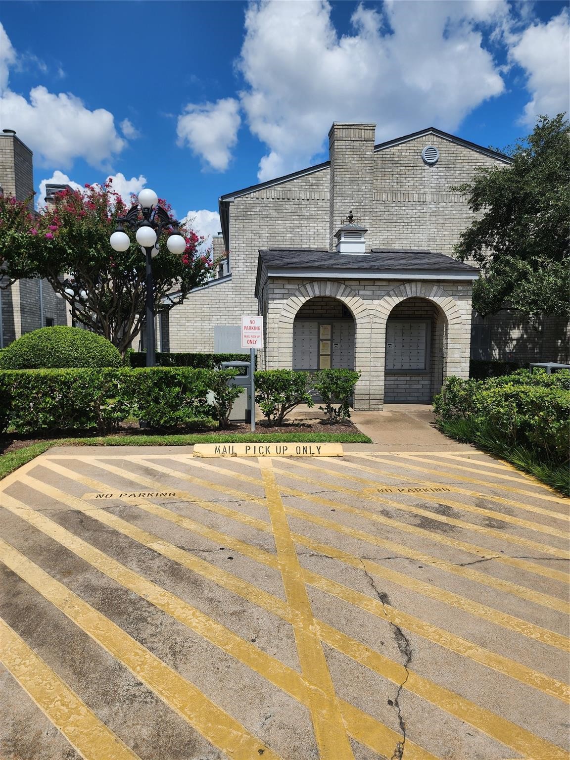 7399 Regency Square Court, Unit 7399 Houston, TX 77036 - Photo 24 of 27 a view of entryway and yard