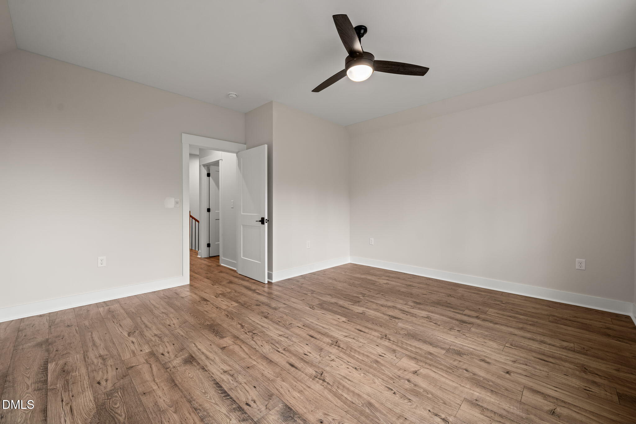 400 Pilot Ridge Road Zebulon, NC 27597 - Photo 36 of 51 a view of empty room with wooden floor