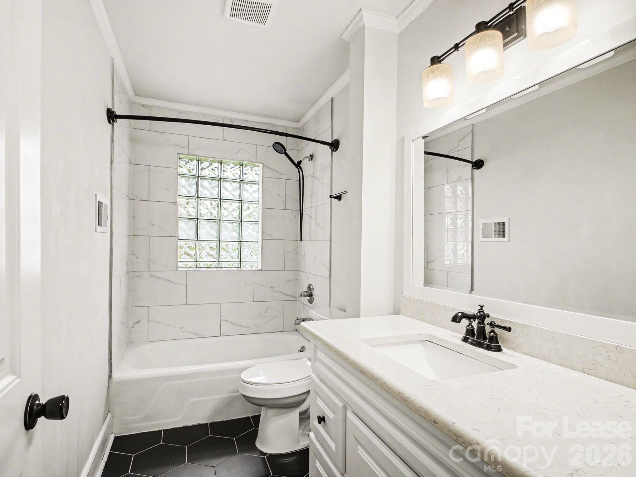 782 Union Street South Concord, NC 28025 - Photo 17 of 28 a bathroom with a bathtub shower sink vanity and a toilet