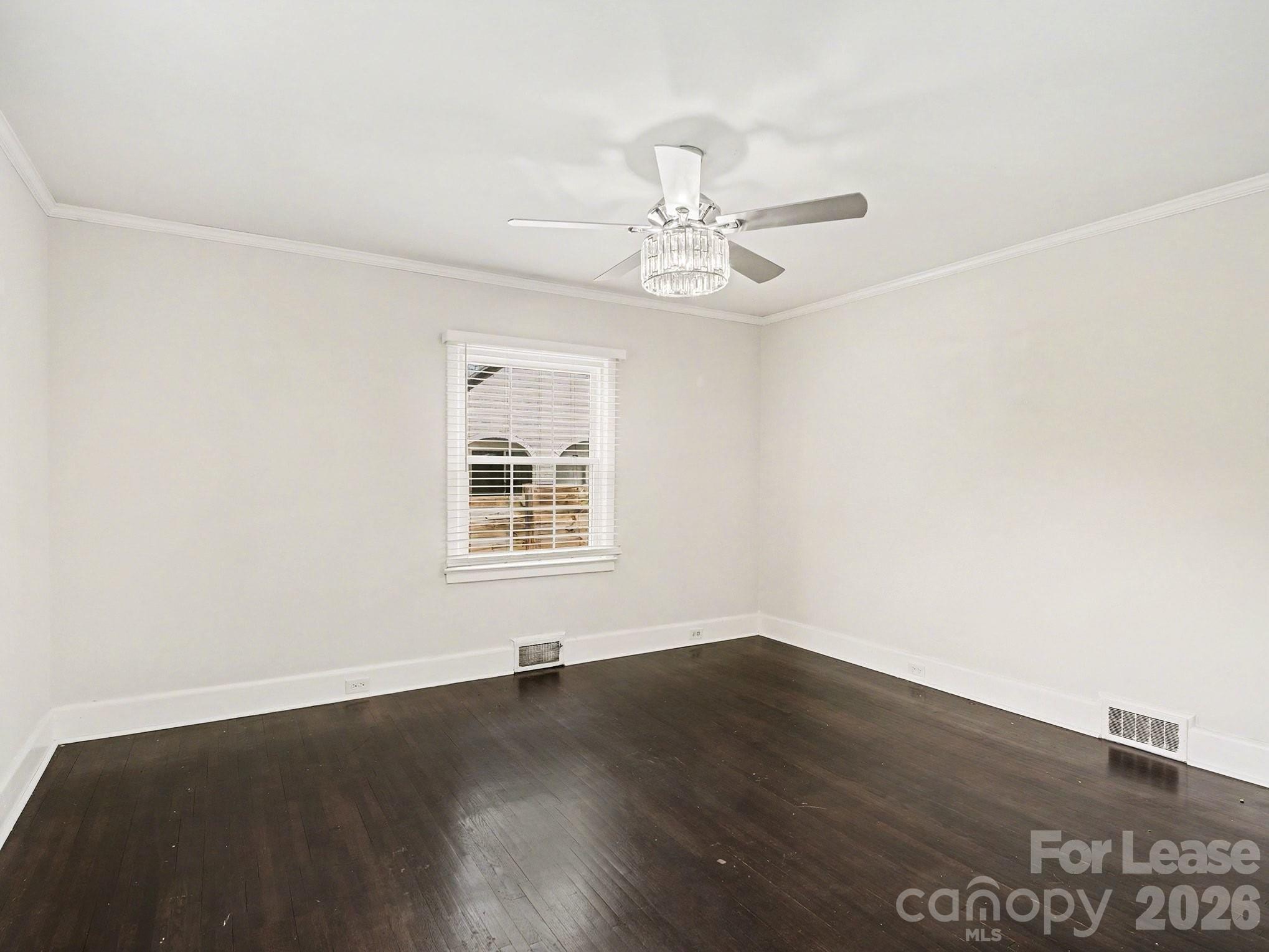 782 Union Street South Concord, NC 28025 - Photo 22 of 28 wooden floor in an empty room with a window