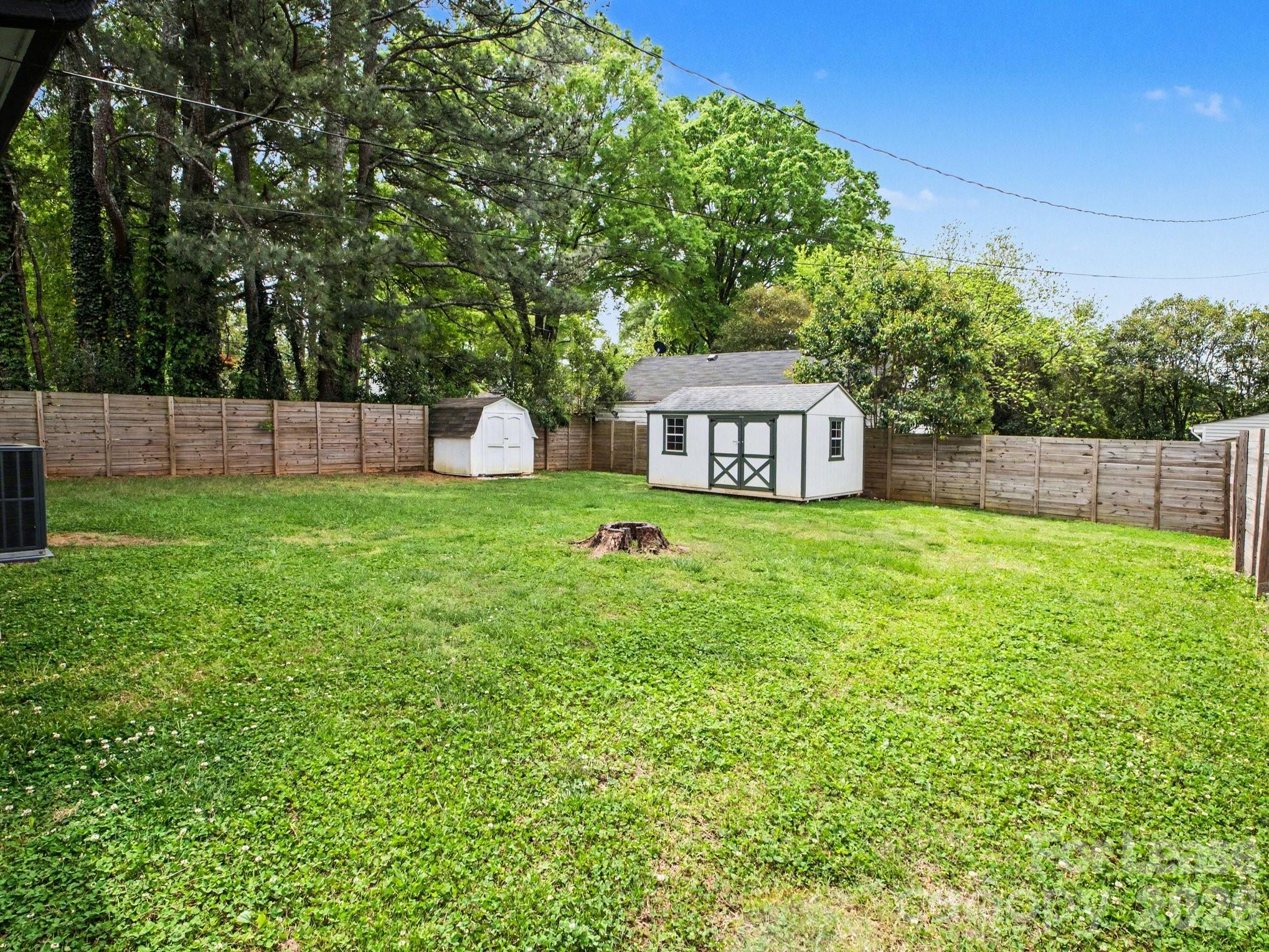 782 Union Street South Concord, NC 28025 - Photo 27 of 28 a view of a house with a backyard porch and sitting area