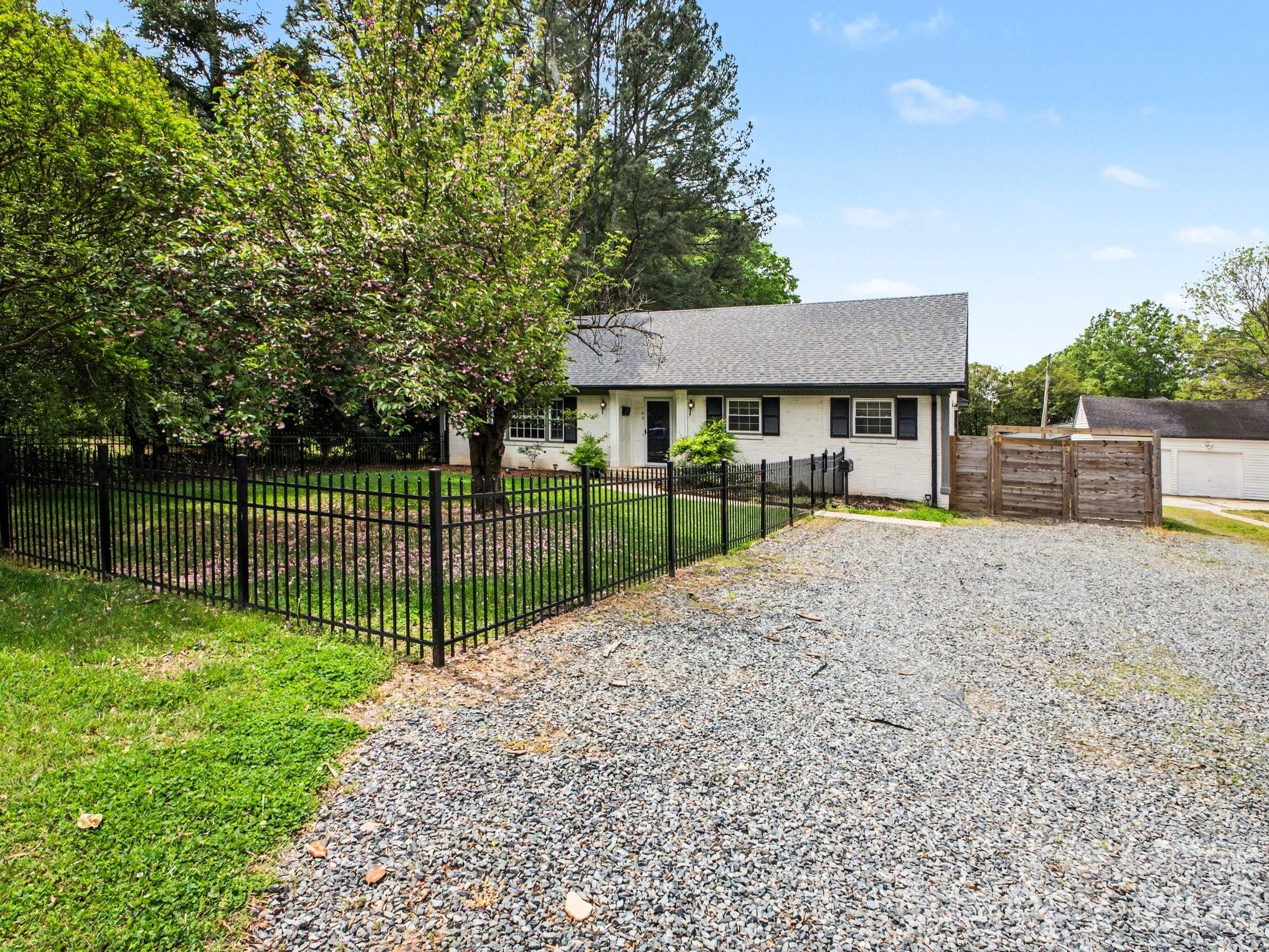 782 Union Street South Concord, NC 28025 - Photo 3 of 28 a view of a backyard with a garden