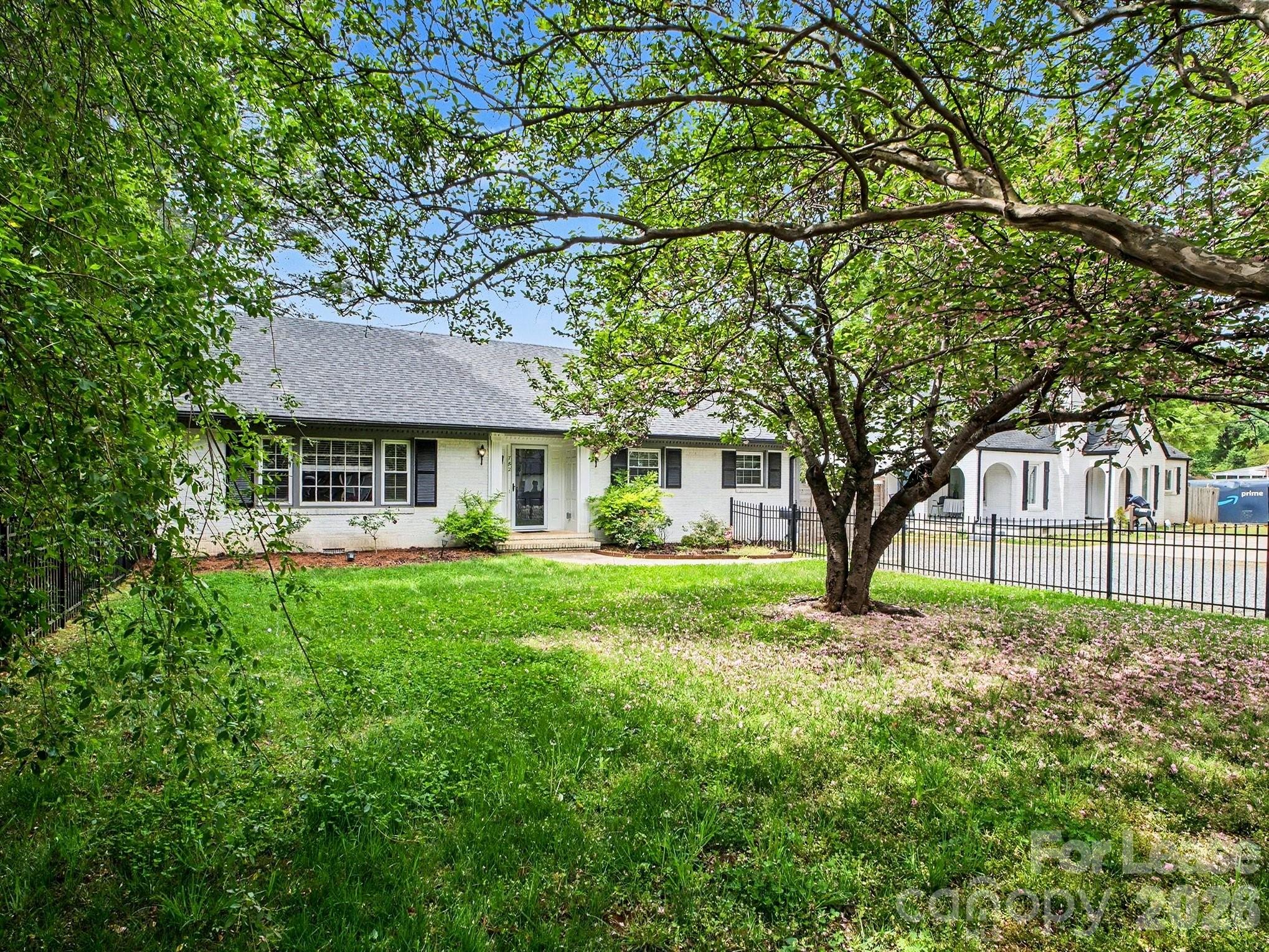 782 Union Street South Concord, NC 28025 - Photo 5 of 28 a front view of a house with a garden
