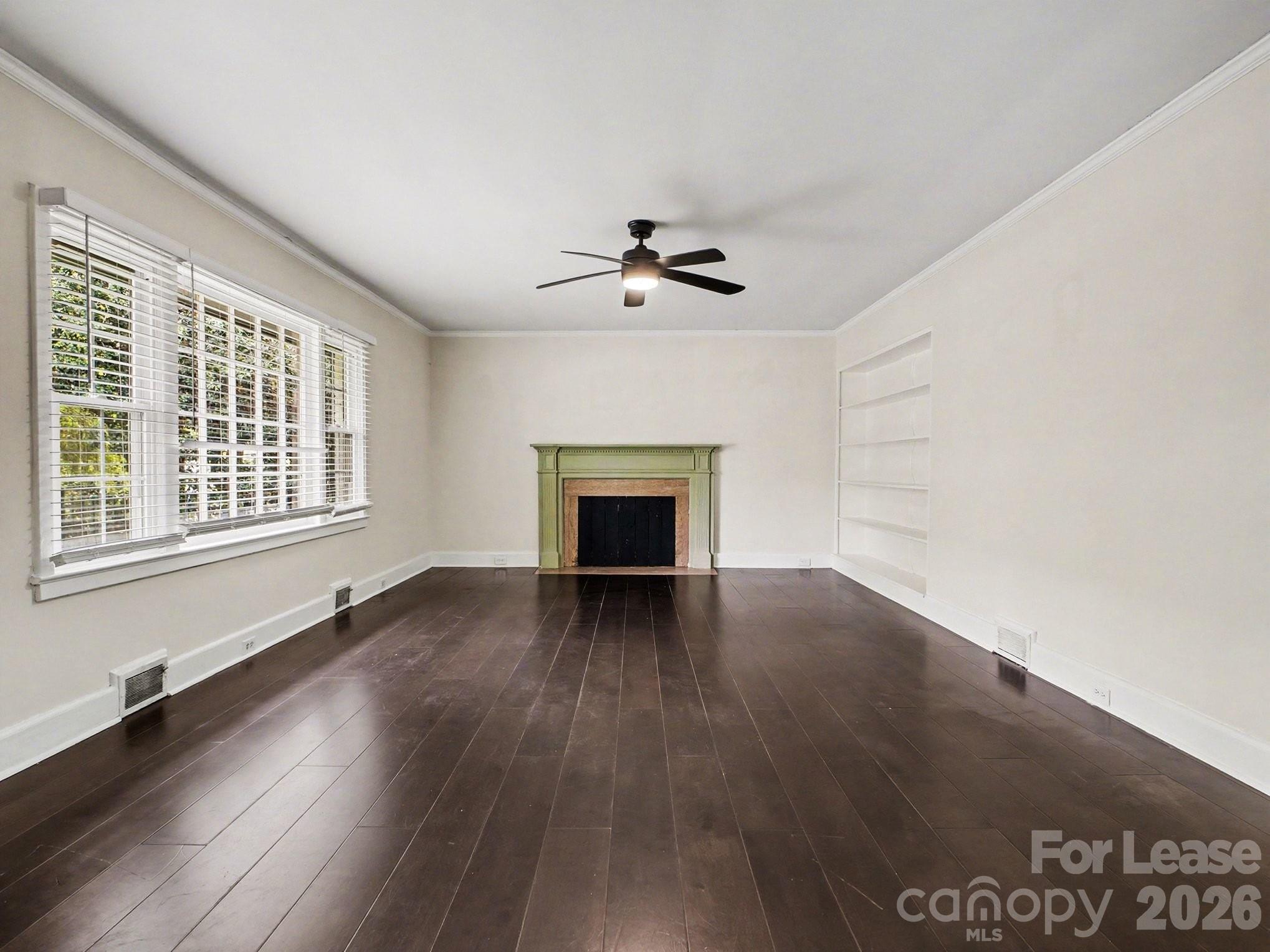 782 Union Street South Concord, NC 28025 - Photo 9 of 28 wooden floor in an empty room with a window