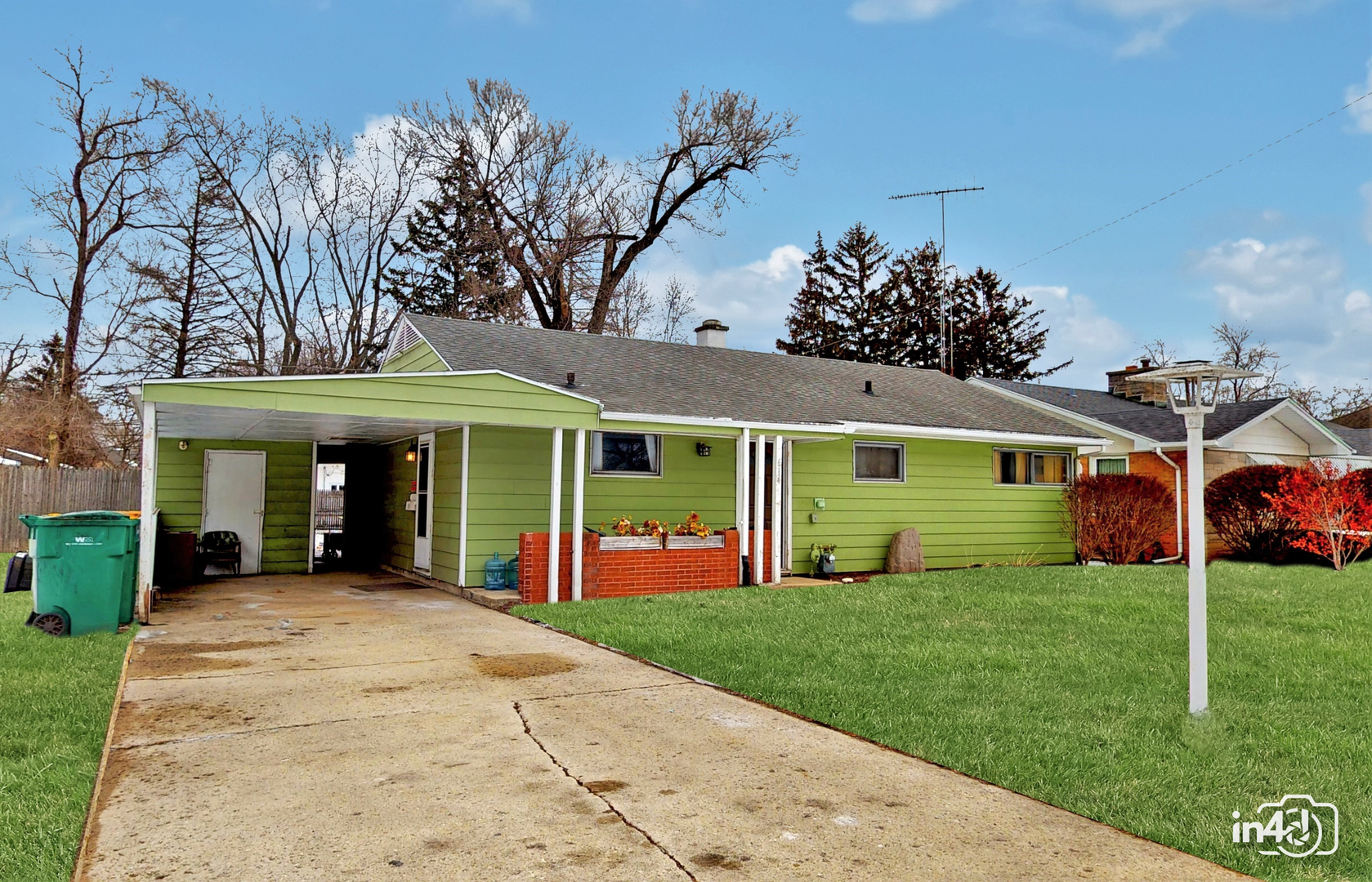 614 North Reed Street Joliet, IL 60435 - Photo 1 of 16 front view of a house with a yard
