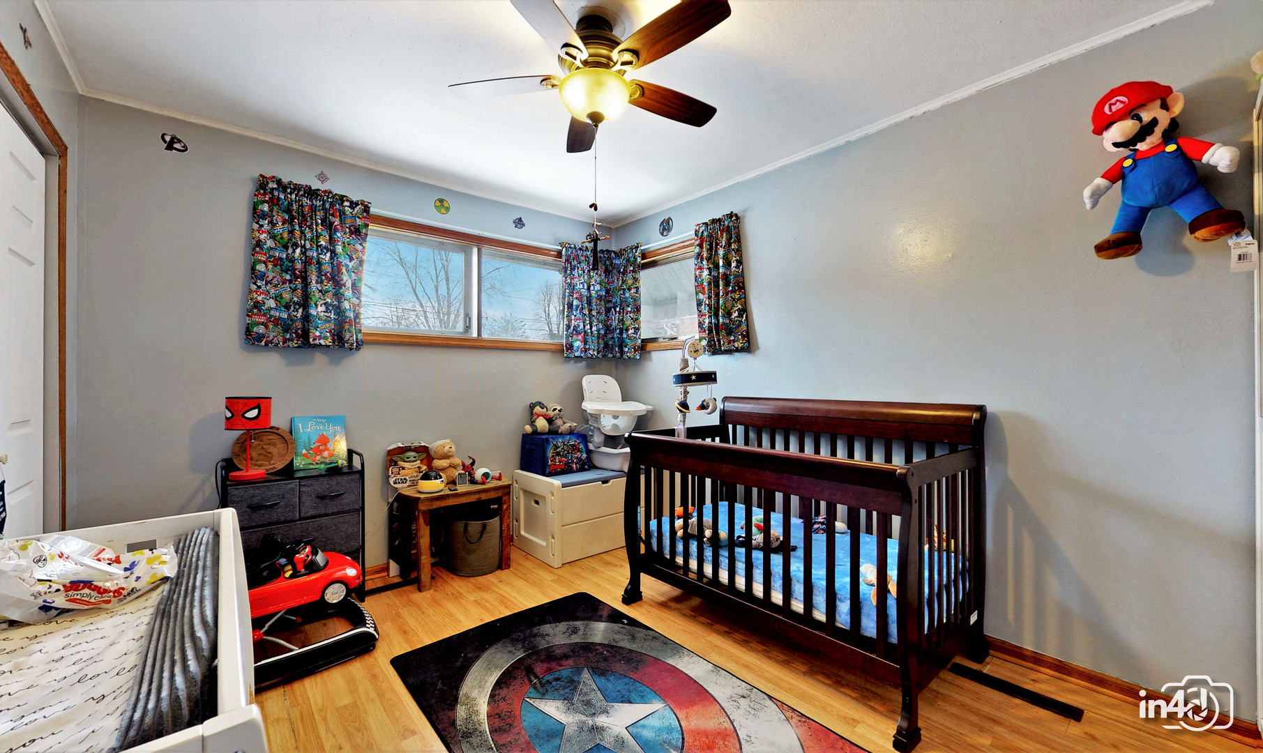 614 North Reed Street Joliet, IL 60435 - Photo 11 of 16 a bedroom with furniture a baby crib and a window