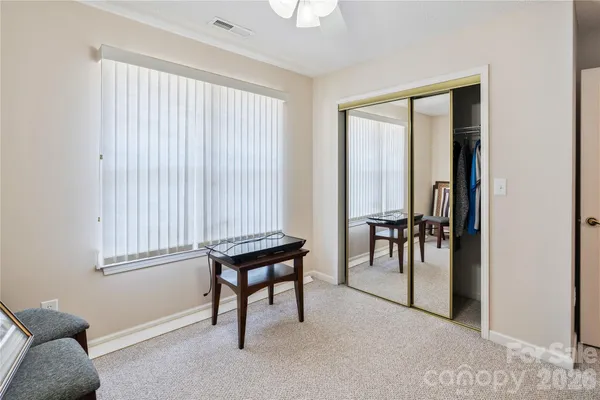 a livingroom with furniture and a window