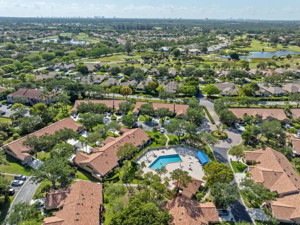 an aerial view of a house with a lake view