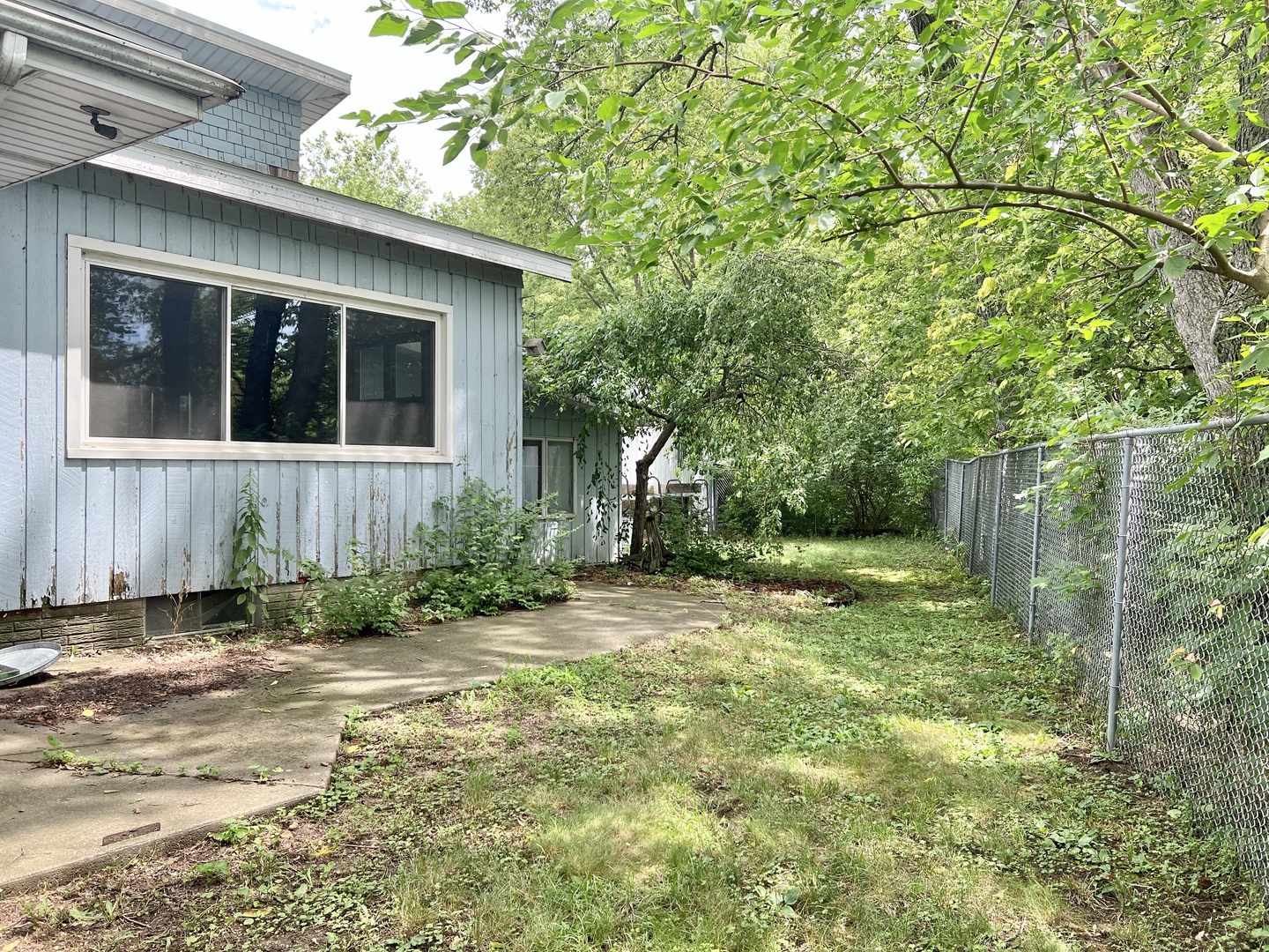20747 Moline Road Lyndon, IL 61261 - Photo 11 of 32 a view of a house with a yard