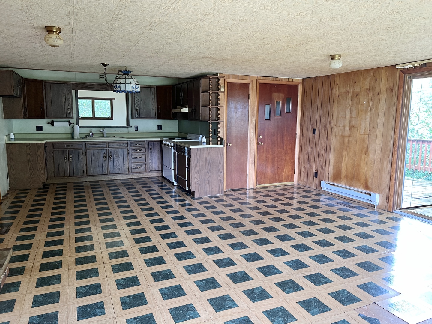 20747 Moline Road Lyndon, IL 61261 - Photo 18 of 32 a room with a black white checkered floor with a black white checkered floor