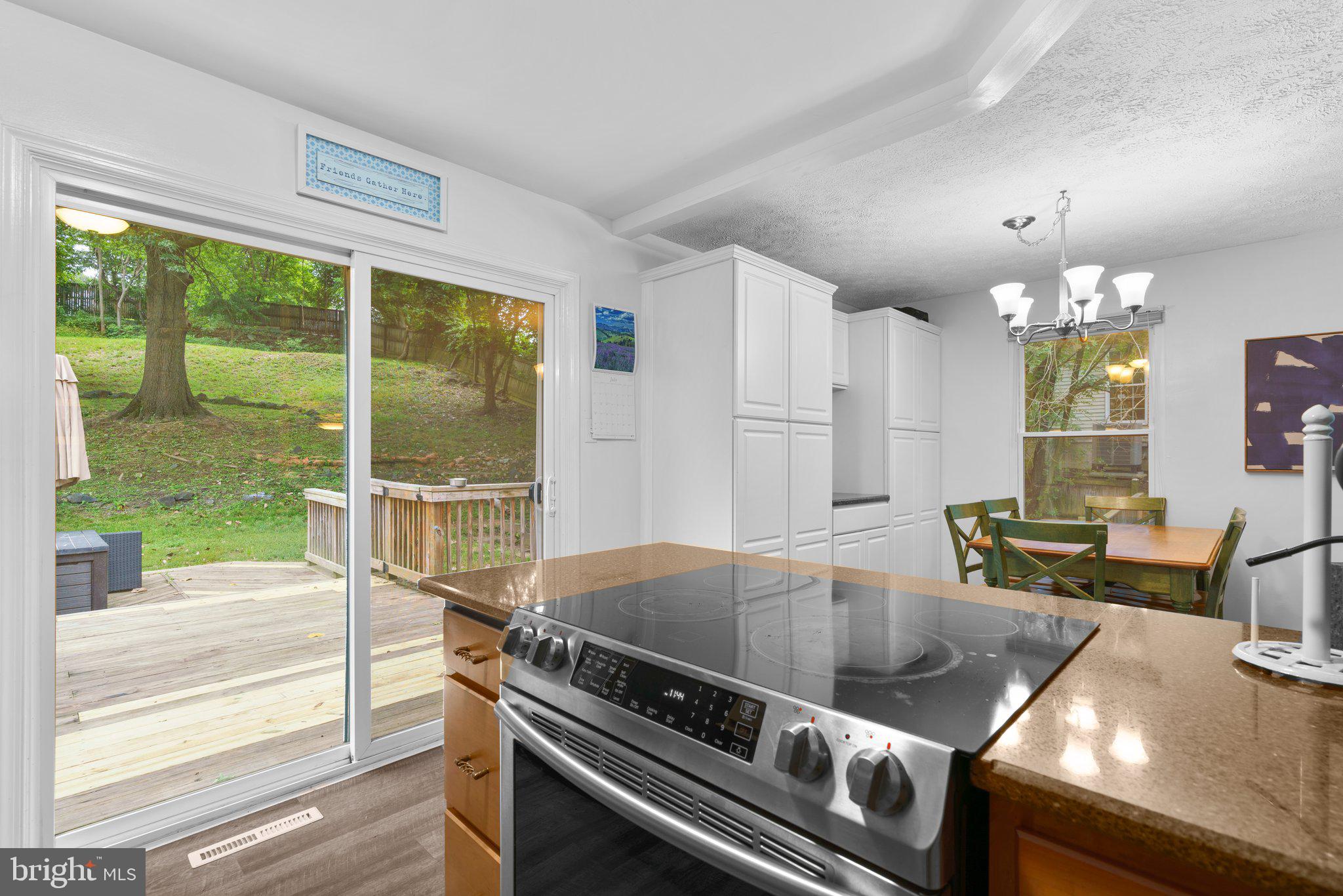8642 Bali Road Ellicott City, MD 21043 - Photo 11 of 29 Slider to Deck off the Kitchen