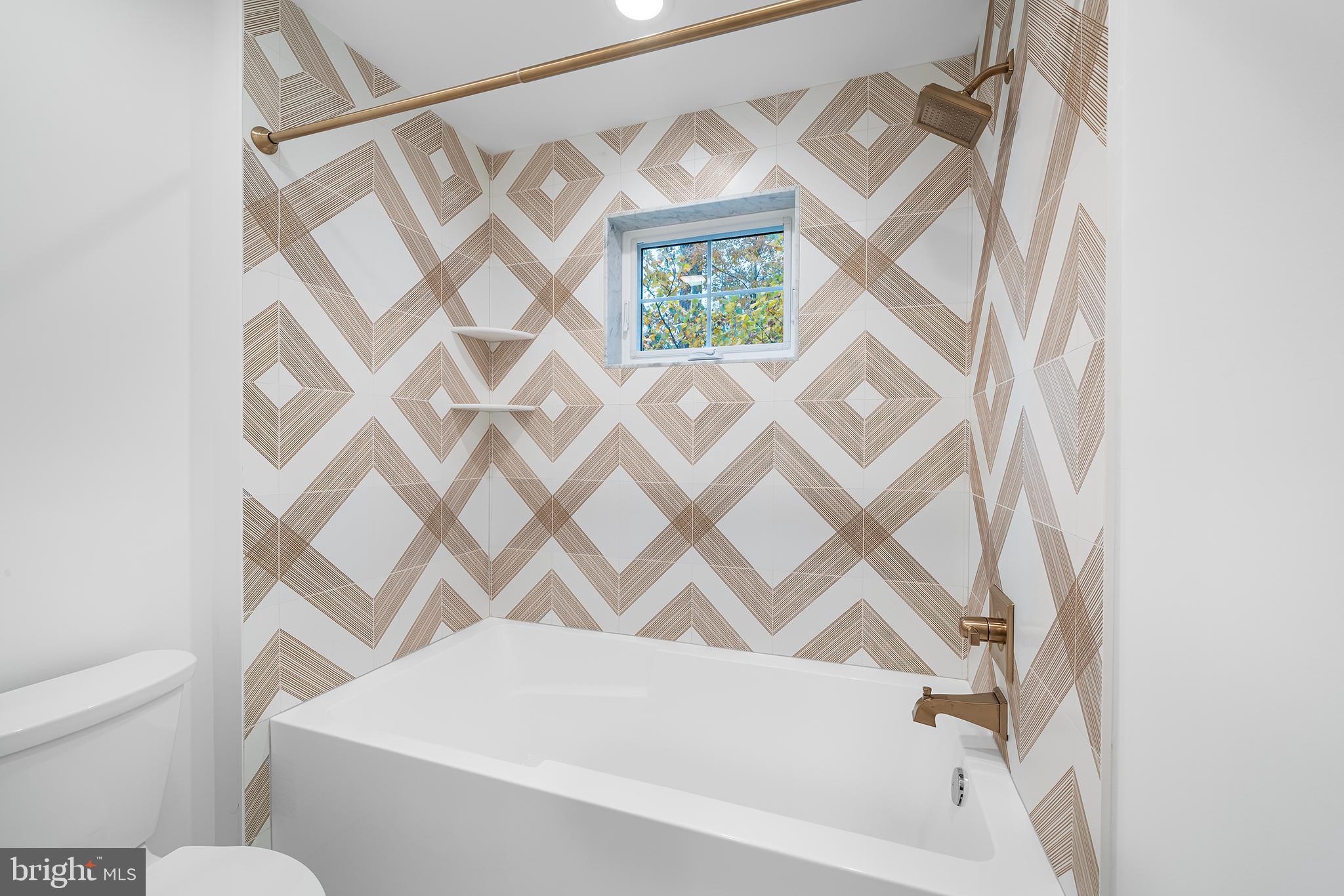 3 Walton Road Blue Bell, PA 19422 - Photo 25 of 46 Stylish bath with geometric tile design.