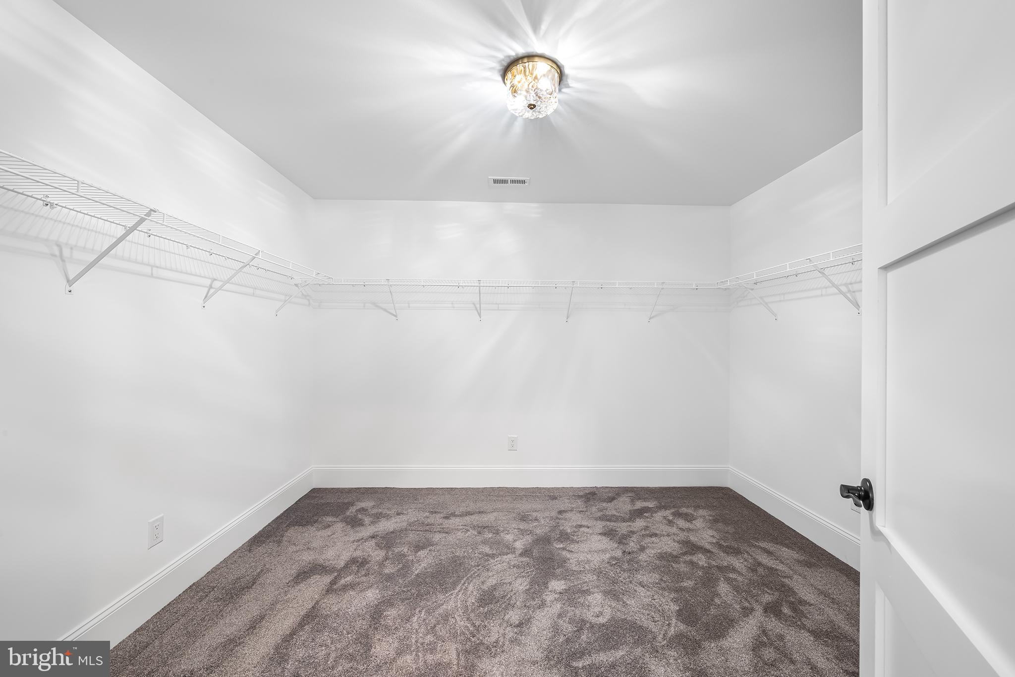 3 Walton Road Blue Bell, PA 19422 - Photo 32 of 46 Spacious, versatile closet with modern lighting.