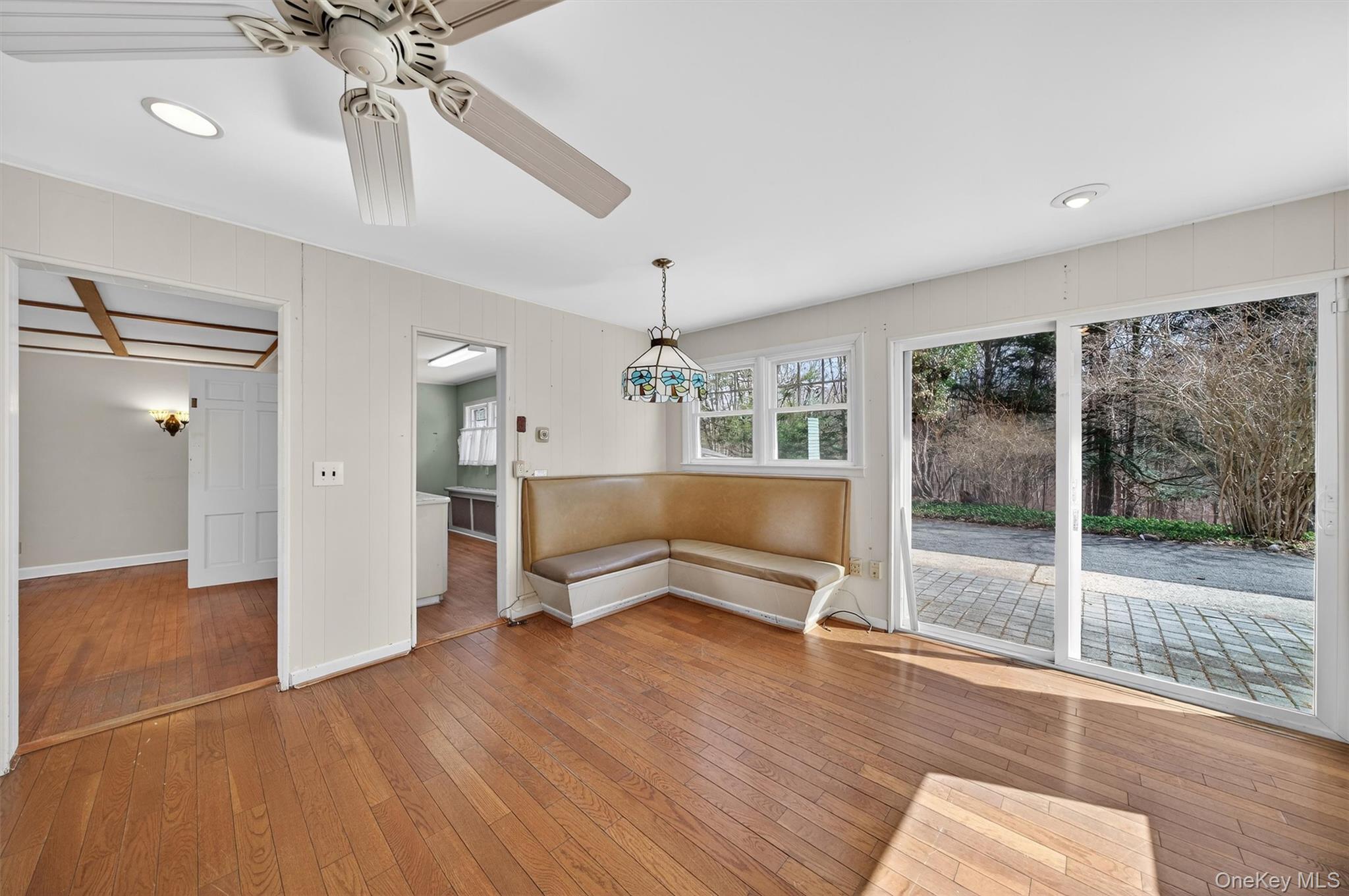 41 Whitlock Road Otisville, NY 10963 - Photo 20 of 48 Sliders let so much light filter into this breakfast area wiiht its built in bech!
