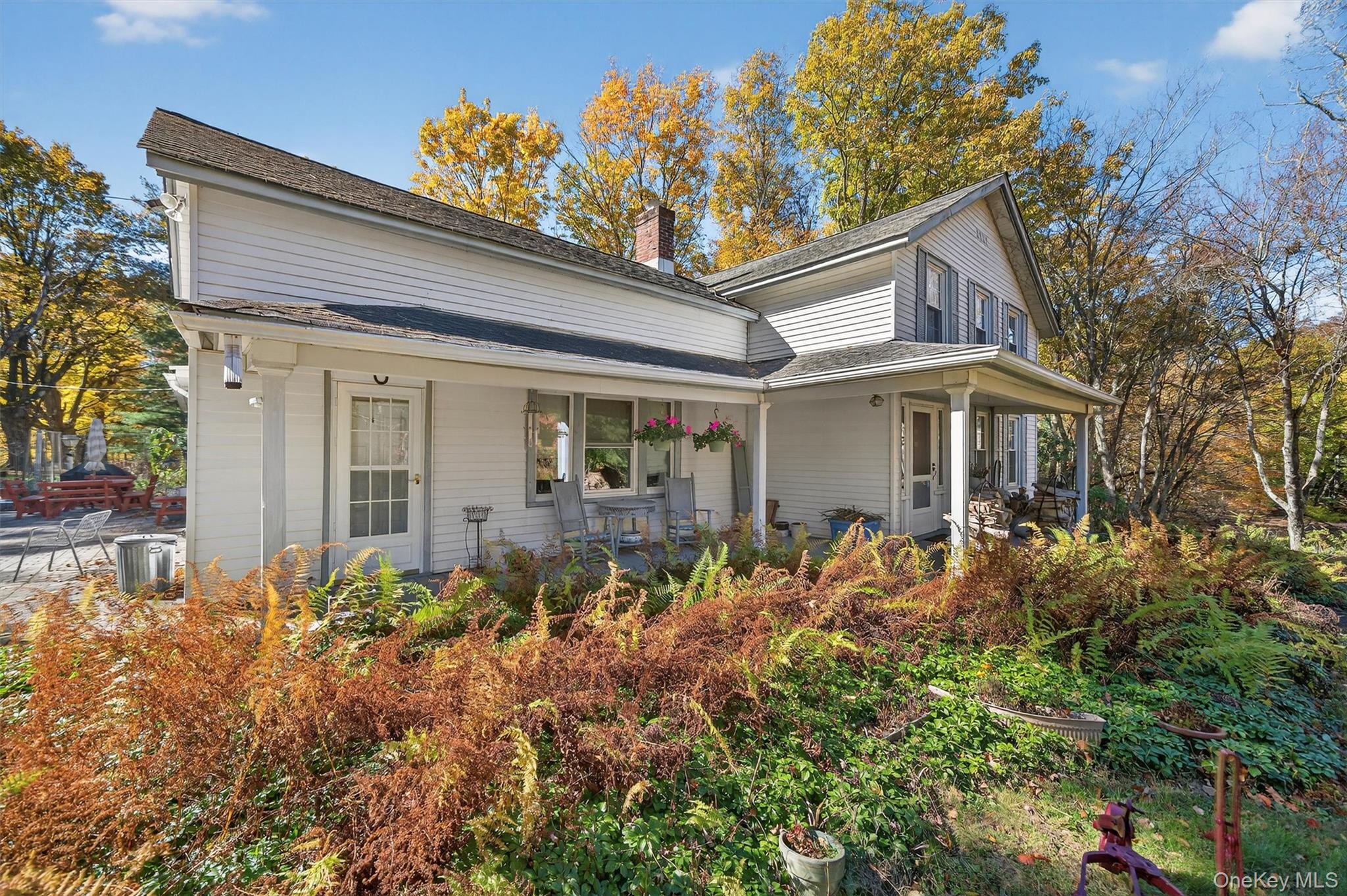 41 Whitlock Road Otisville, NY 10963 - Photo 41 of 48 Two front entrances welcome you to this historic 1860's farmhouse, surrounded by so much lush natural landscaping.