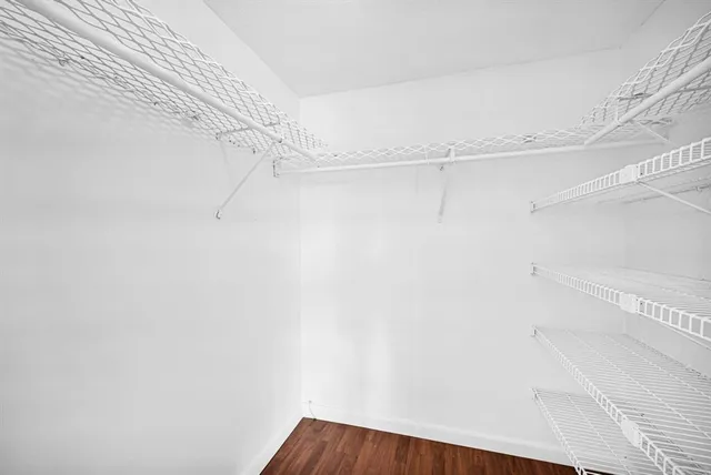 a view of a room with racks on the wall