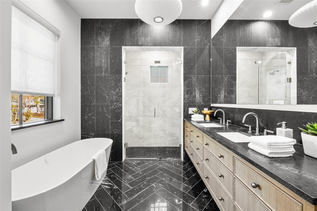 7158 Pasadena Avenue Dallas, TX 75214 - Photo 18 of 39 Bathroom featuring a shower stall, tile walls, double vanity, and a soaking tub